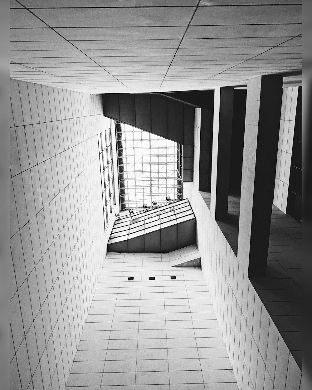 grayscale photography of inside building view