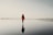 woman in red top walking on beach
