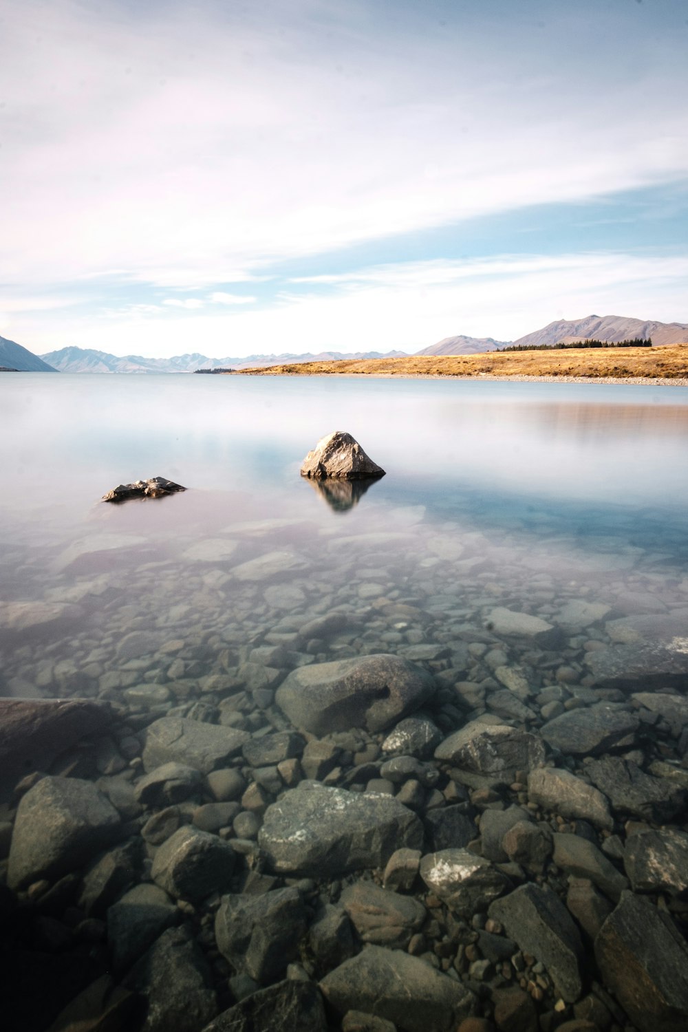 lake surrounded with mountain