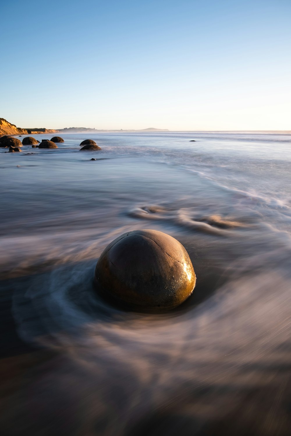 gray stone on lake