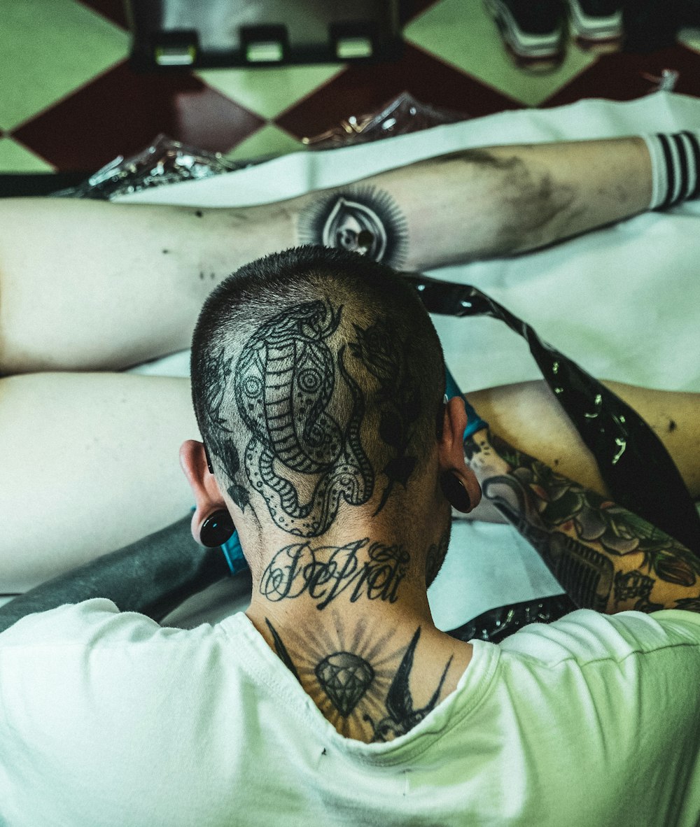 man doing tattoo