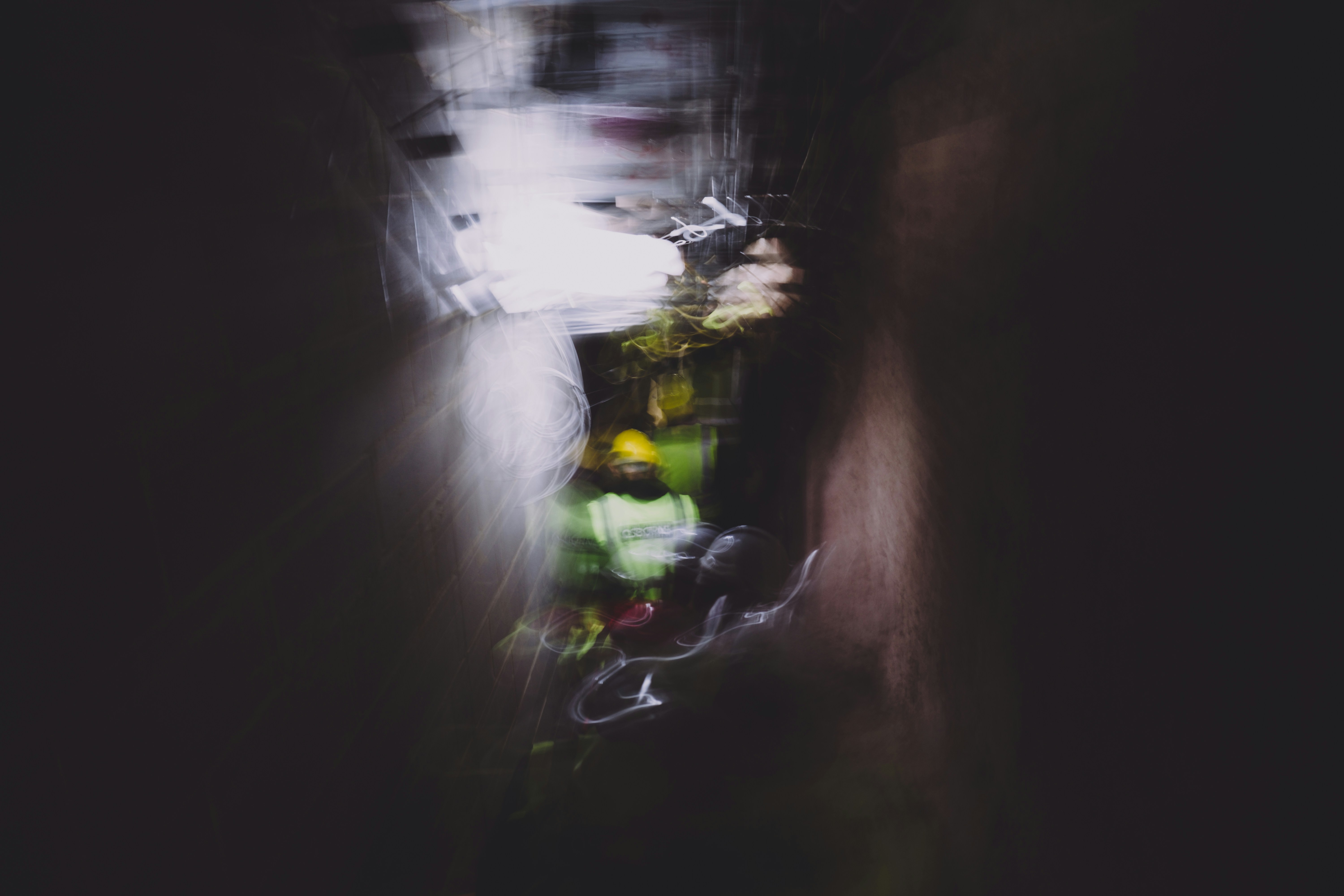 a blurry photo of a person riding a bike