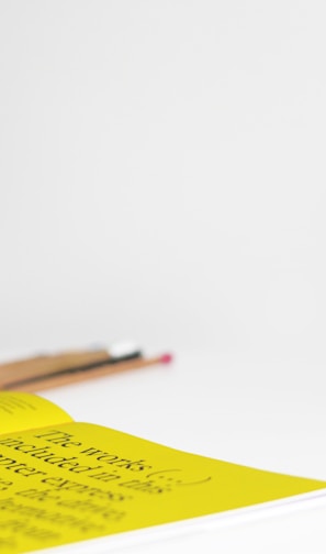 yellow printer paper on table