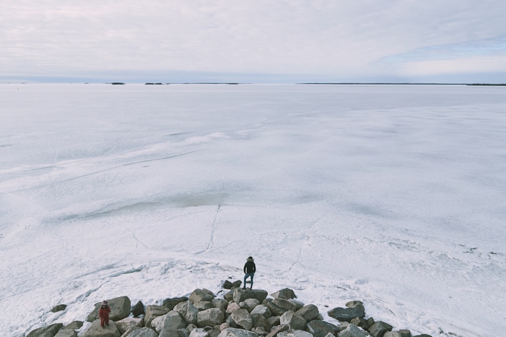 person standing on icy surface