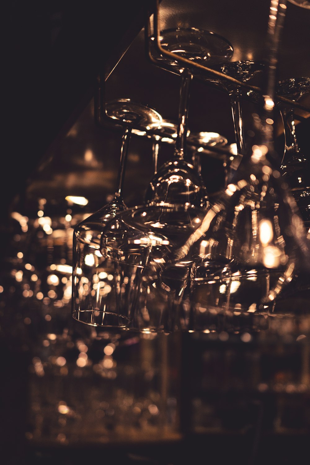 a bunch of wine glasses sitting on top of a table