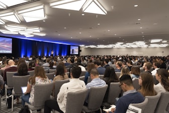Professional speaker engaging audience at a conference