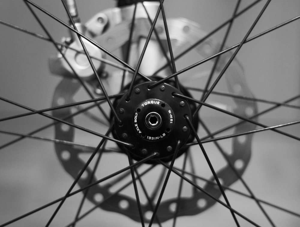 grayscale photo of bicycle wheel