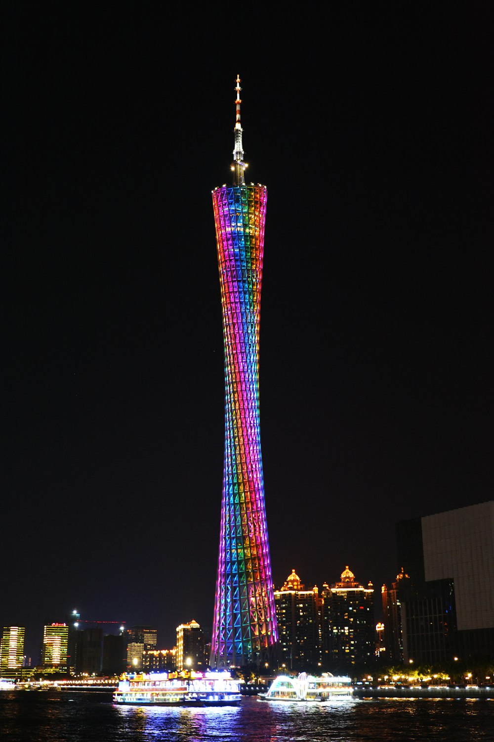 lighted spiral tower during nighttime