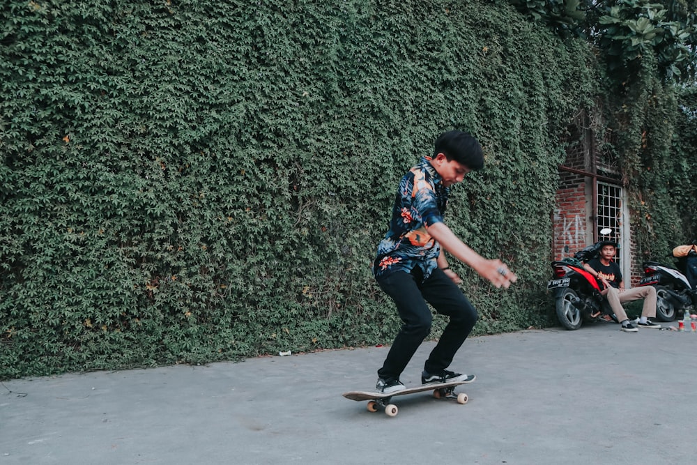 man skateboarding during daytime