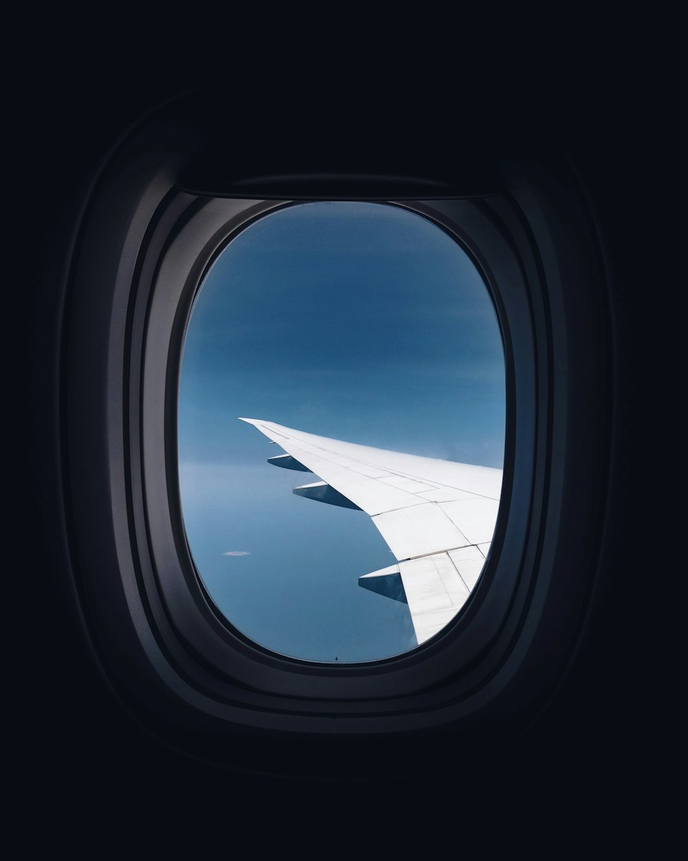 airplane window view of wings