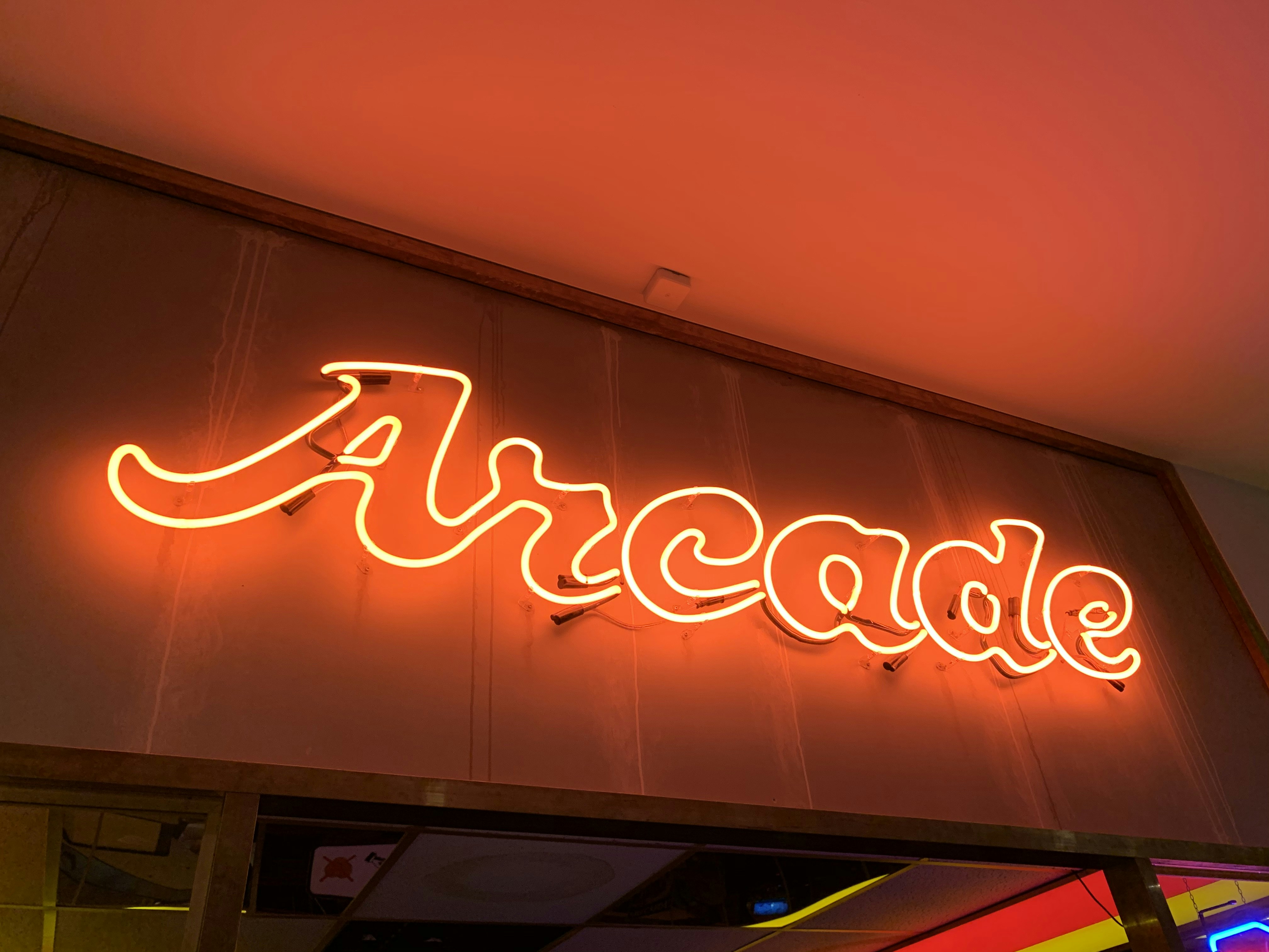 turned on arcade neon signage