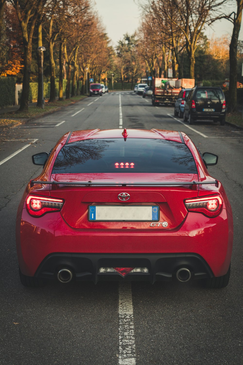 red Toyota GT coupe on road