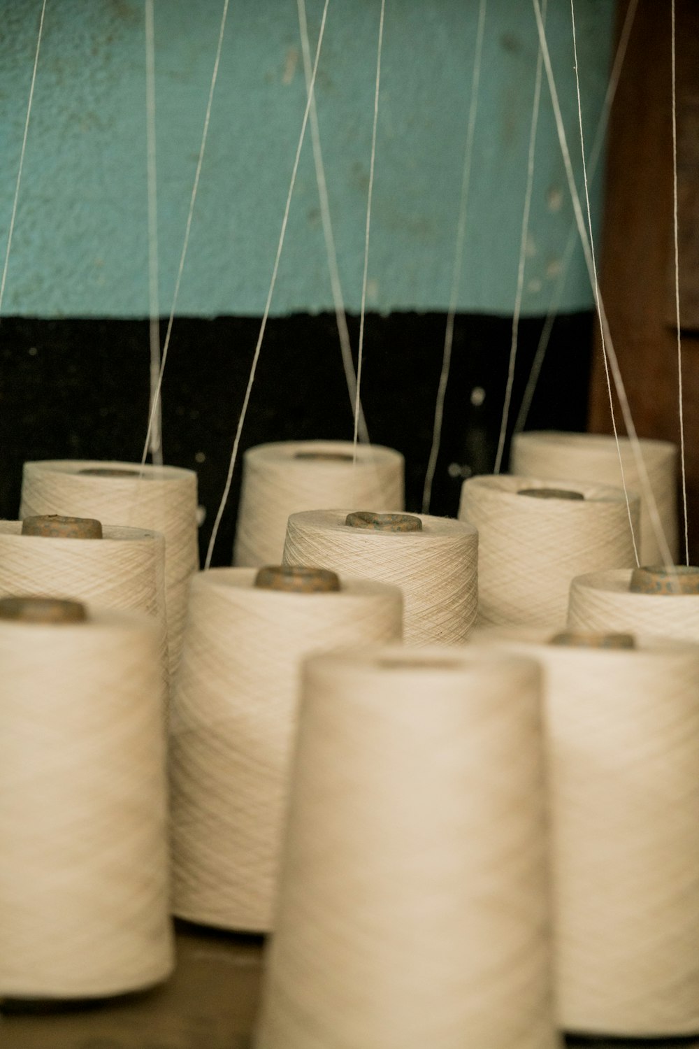 selective focus photography of white threads