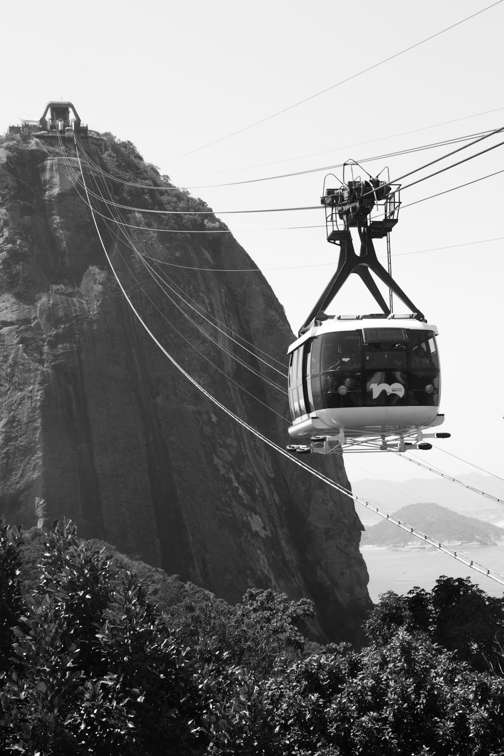 greyscale photo of cable car