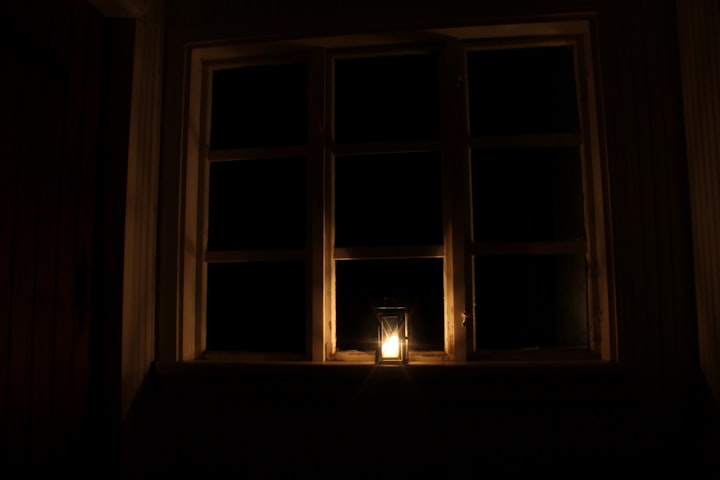 The Old Woman and the Burning Candle in the Window