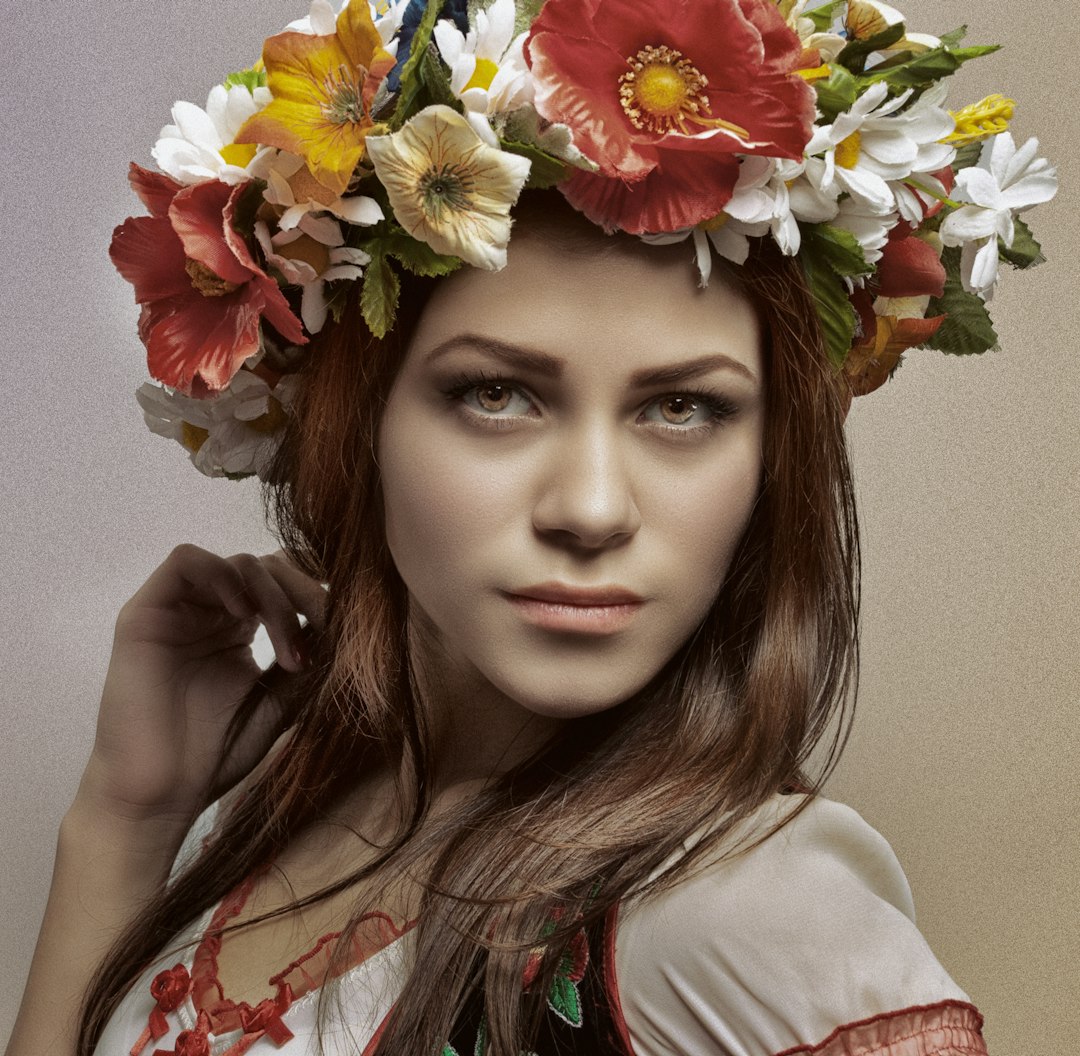 selective focus photography of woman wearing flower headdress