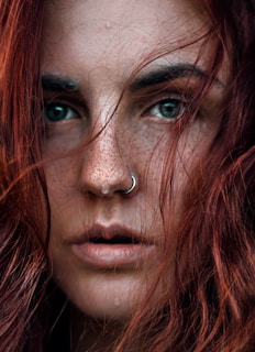 portrait photograph of woman with silver nose ring