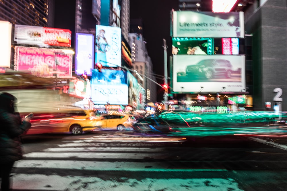 a blurry picture of a city street at night