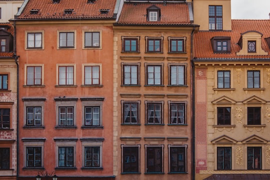 brown concrete building in Old Town Market Square Poland