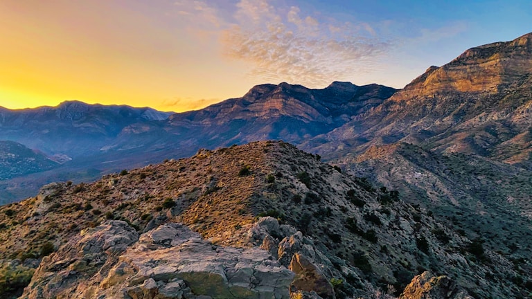 A breathtaking mountain landscape at sunset.