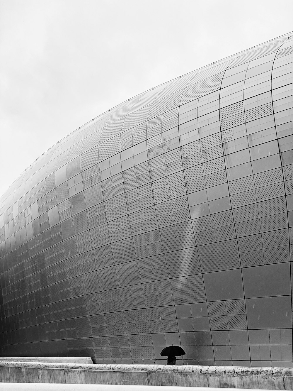 person walking outside building