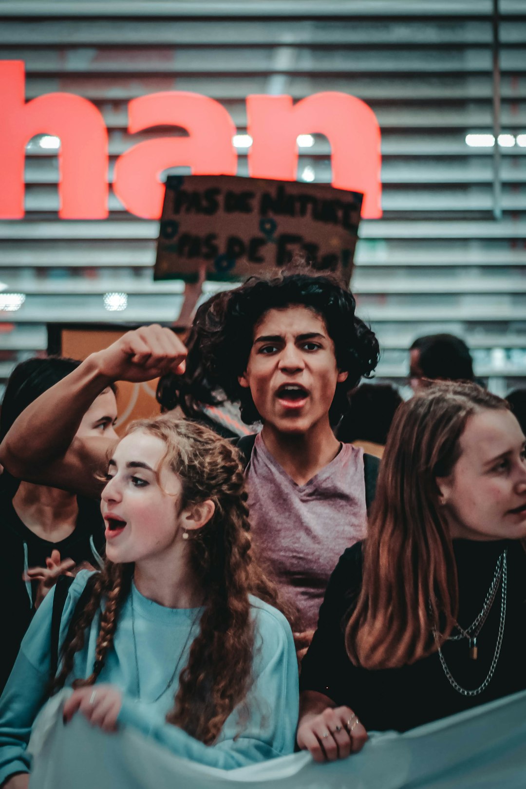 people protesting during daytime