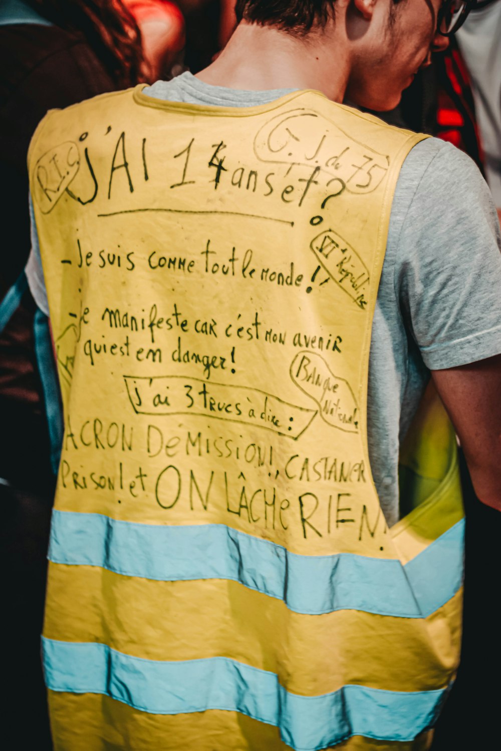 man wearing yellow vest