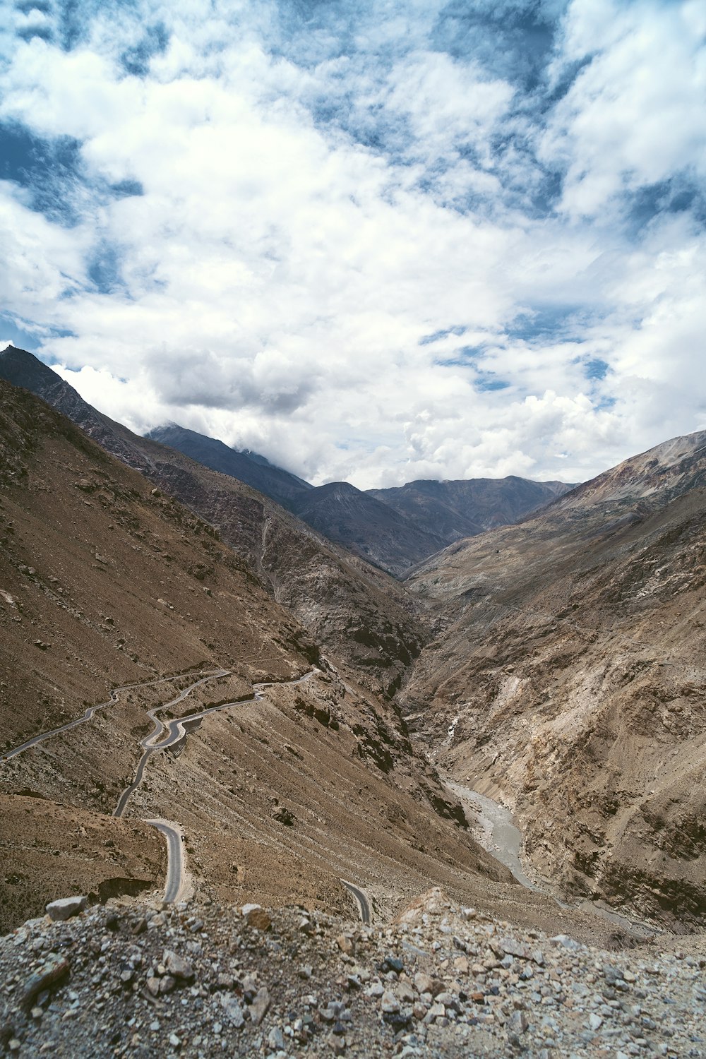 road on mountain slope during daytime