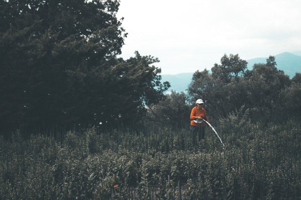 woman wearing orange shirt