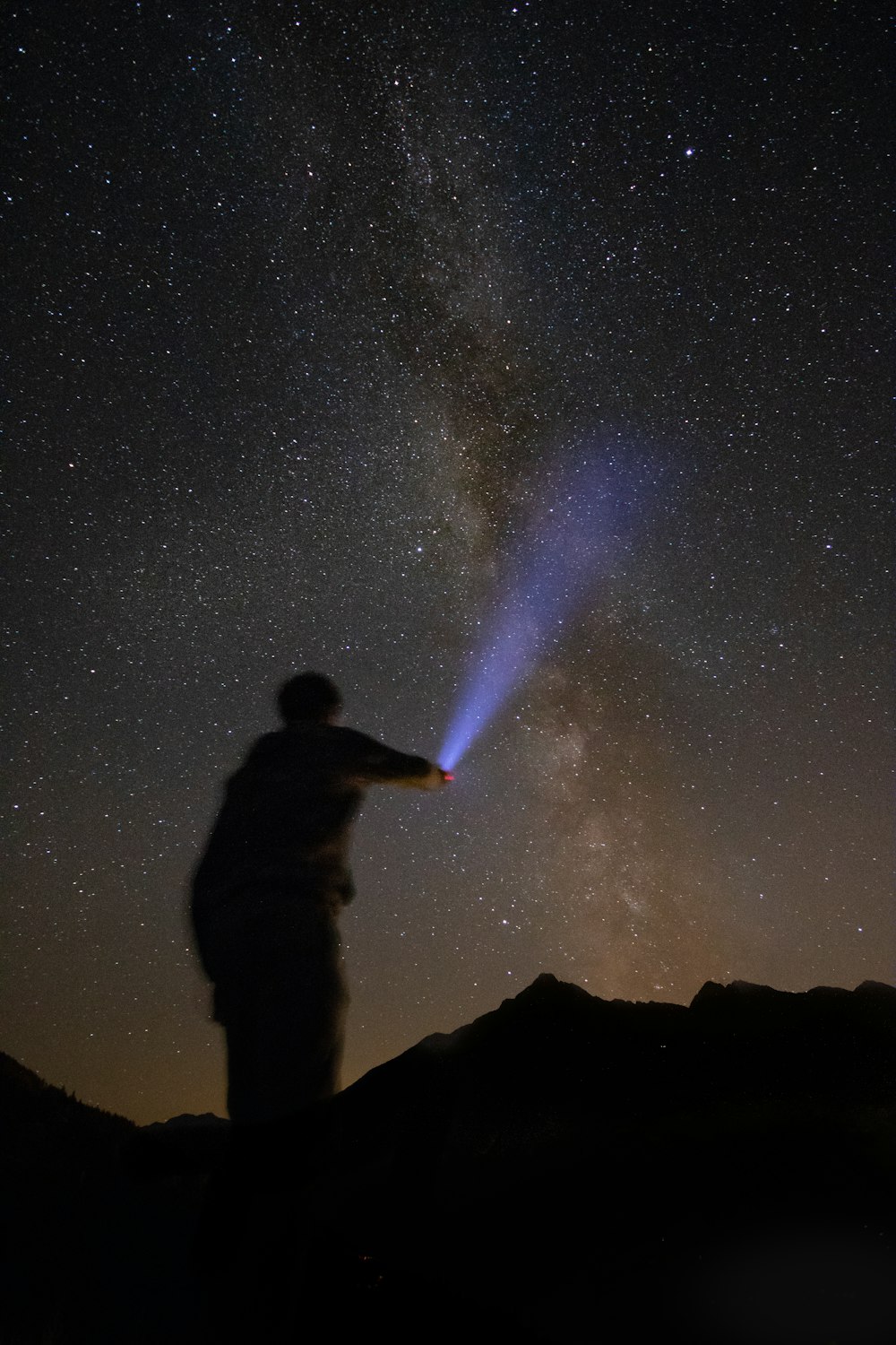 person holding flashlight