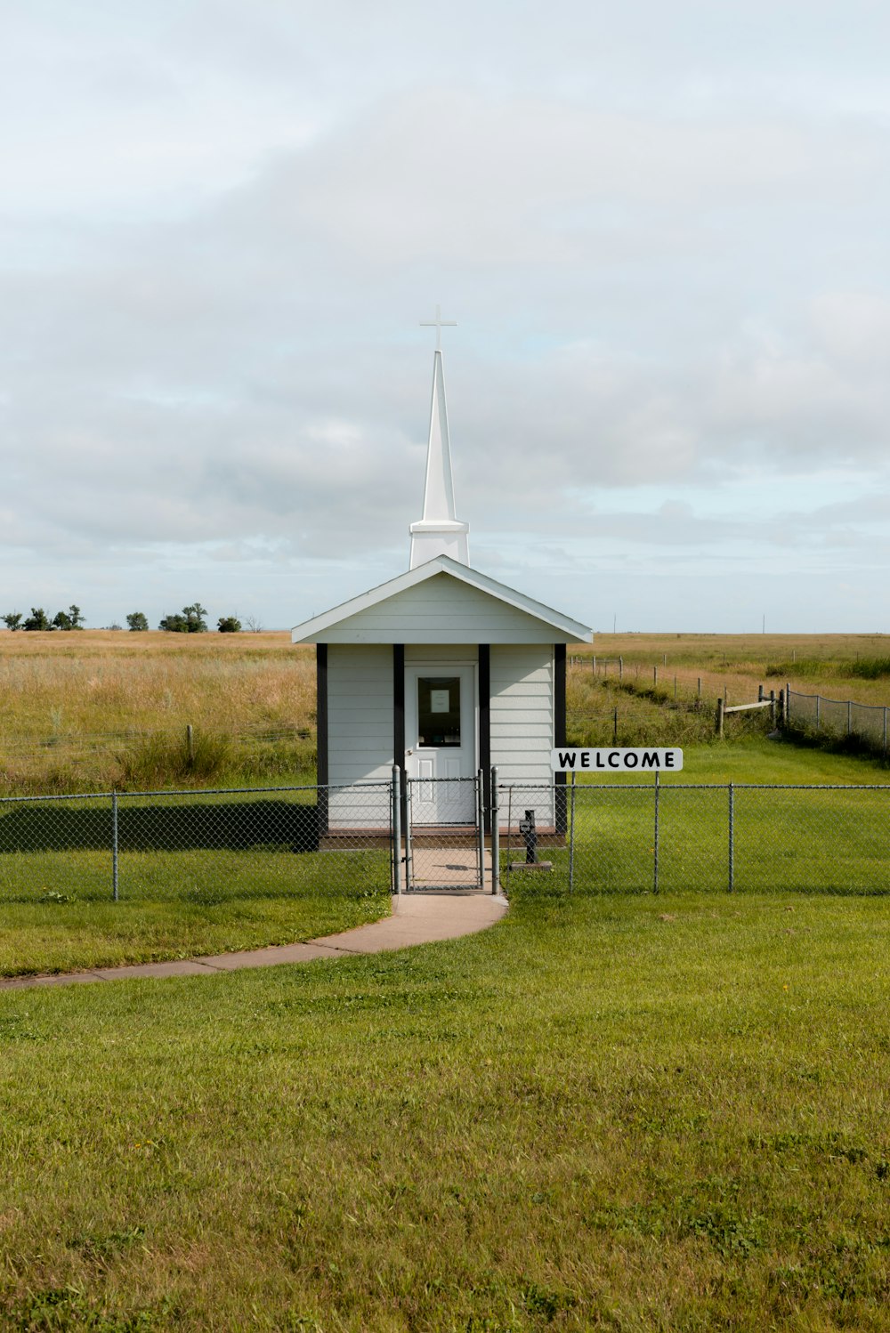 white wooden shed