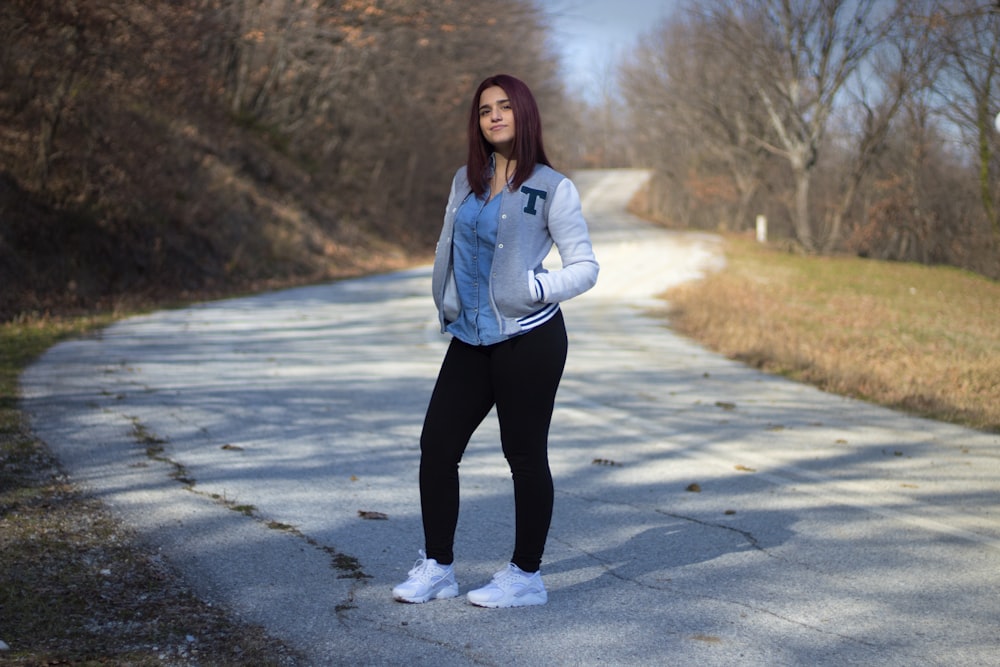 woman standing on road