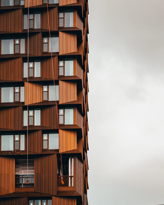 Facade of a modern building being cleaned with warm osmotic water technology