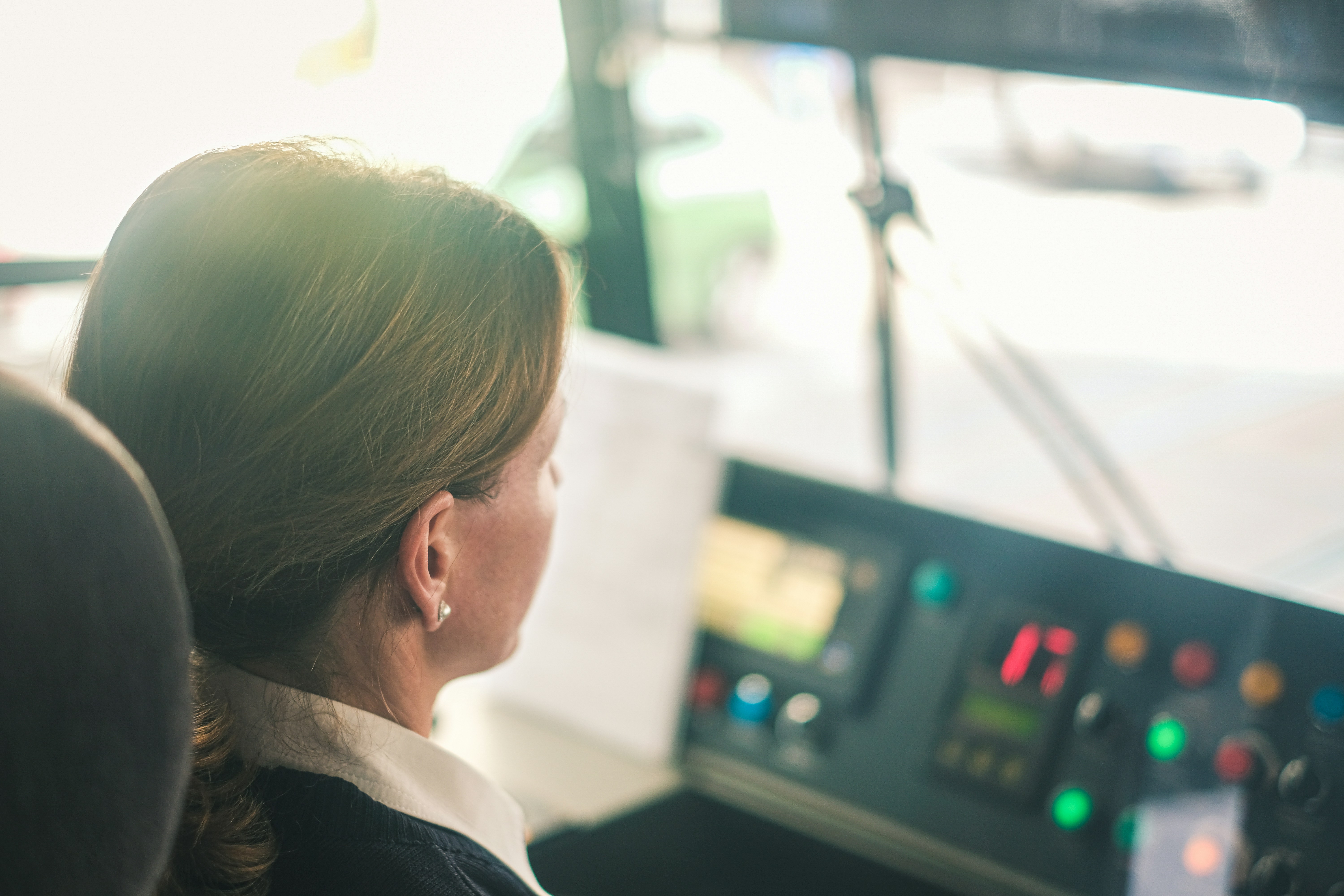 woman sitting on driver's seat