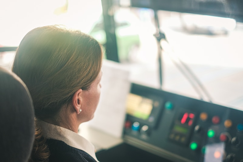 woman sitting on driver's seat