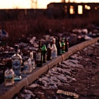 bottles on brown concrete surface