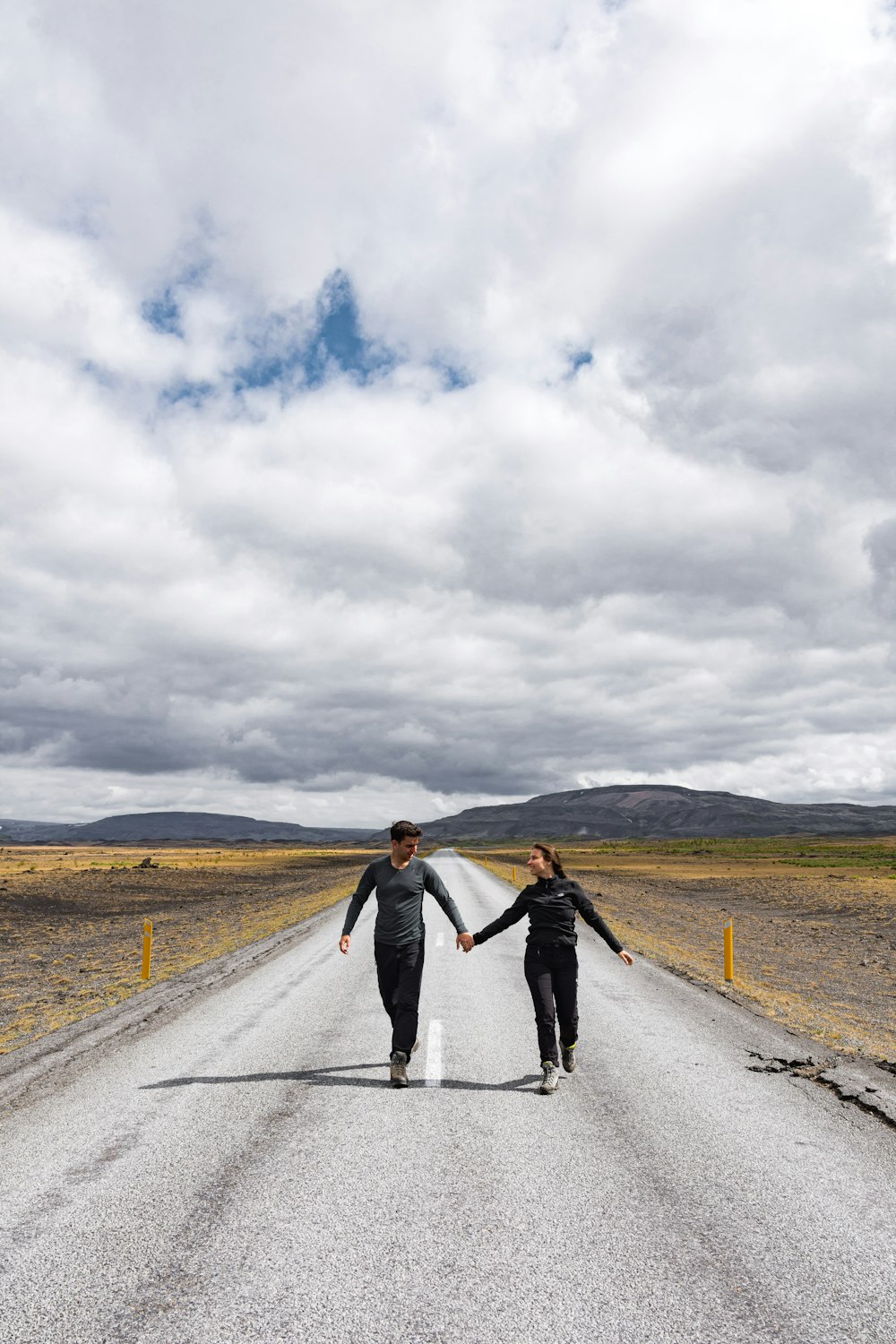 couple walking on road