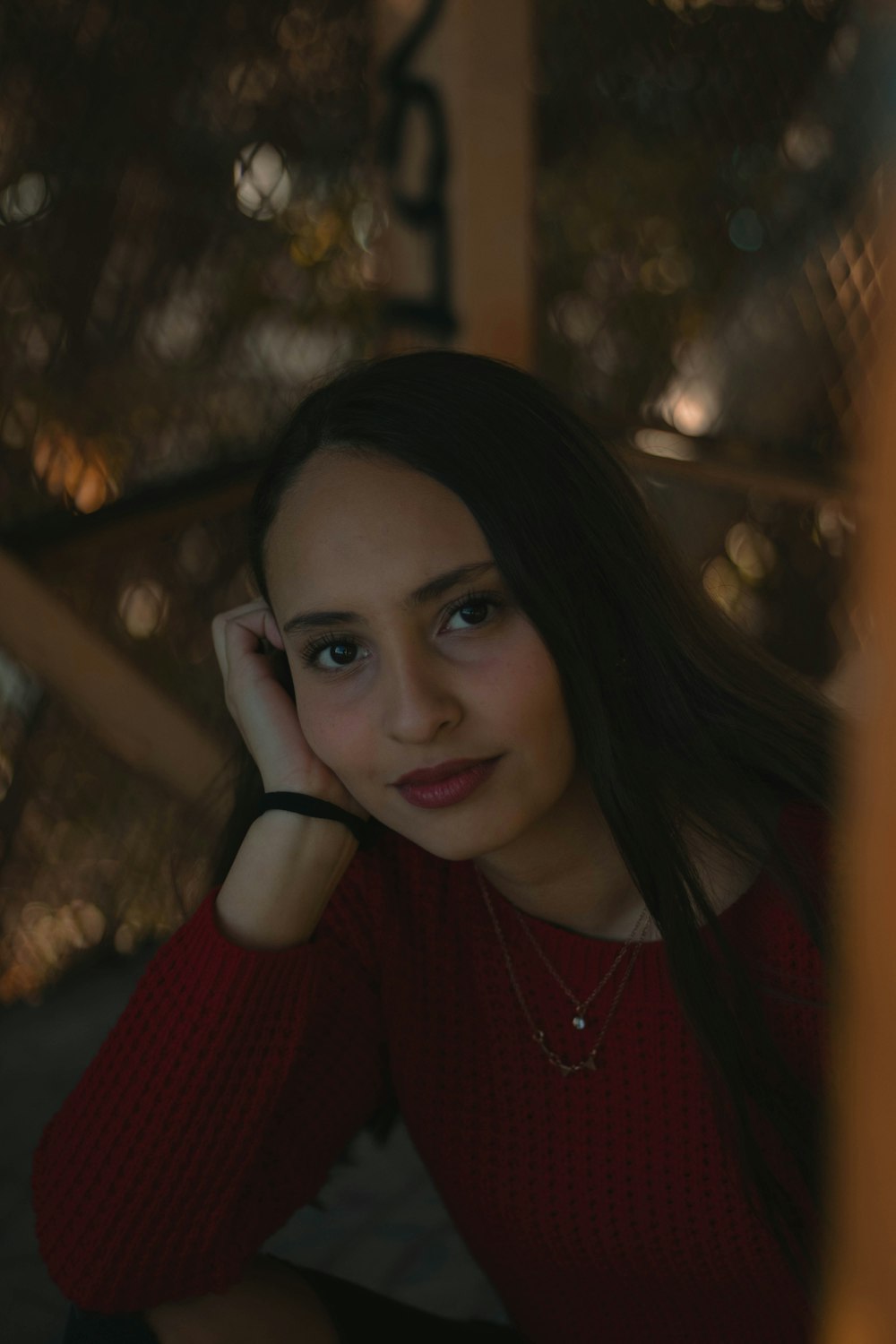 woman wearing red sweatshirt