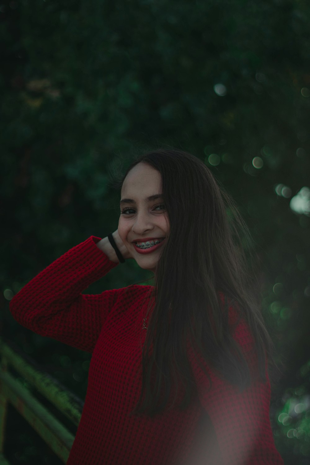 woman wearing red sweater