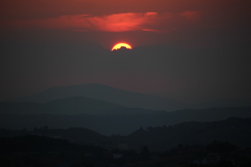 silhouette of mountains during sunset