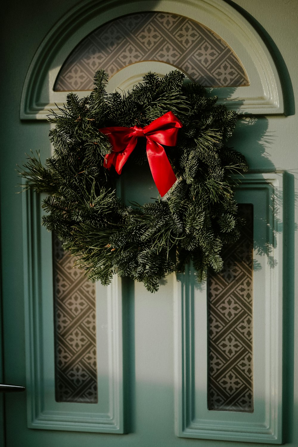 green wreath on door