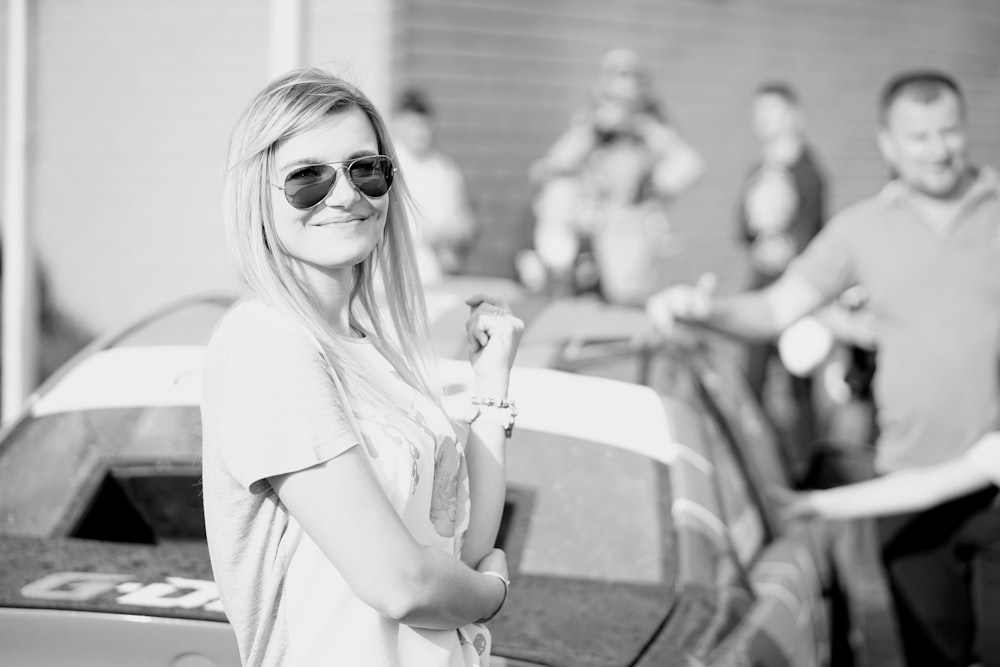 grayscale photography of woman in t-shirt