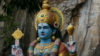 blue and gold deity statue