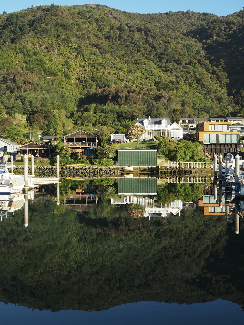 body of water near buildings during day