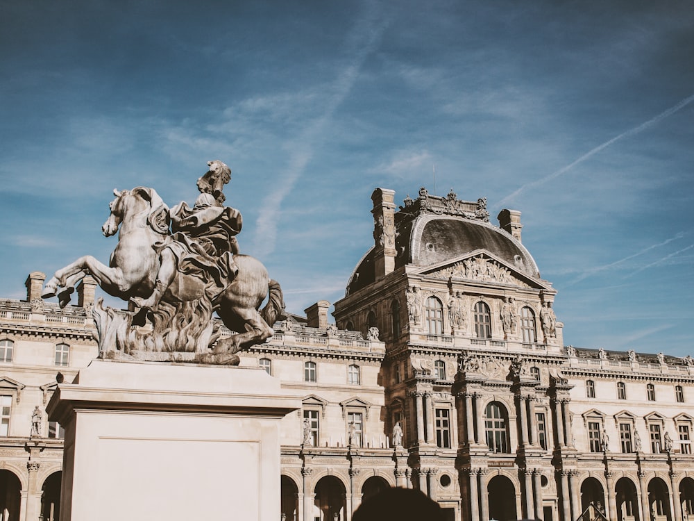 man riding horse statue