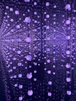 Audience immersed in a 360-degree XR storytelling experience with subtle lighting.