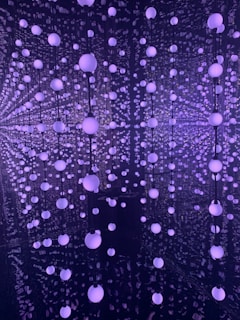 Audience immersed in a 360-degree XR storytelling experience with subtle lighting.