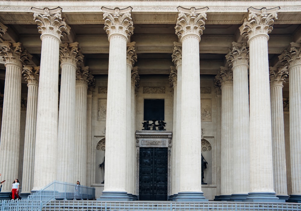 woman standing near building