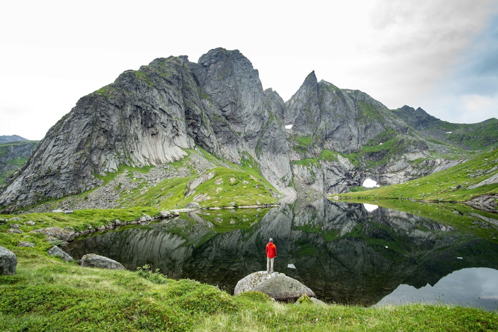 man standing on rock