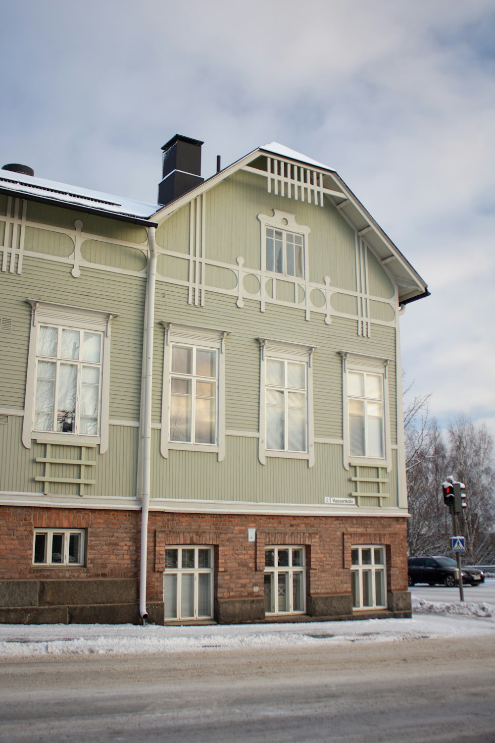 gray and white 3-storey house